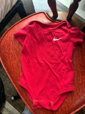 Nike Red Infant Bodysuit with White Swoosh
